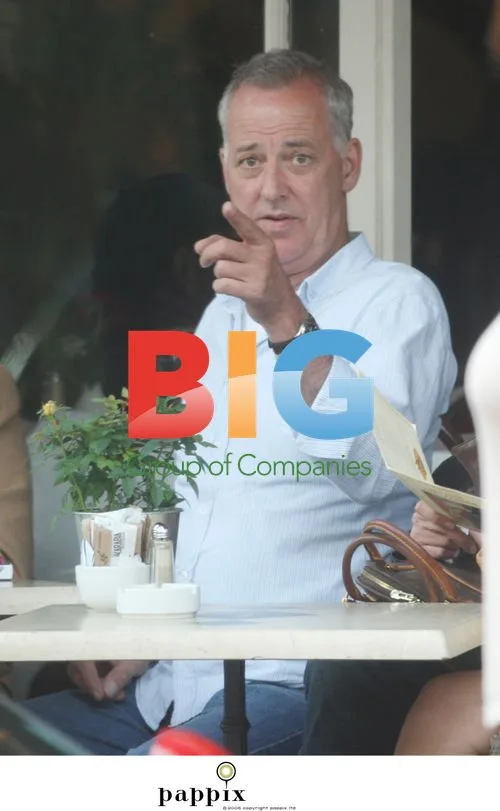 Michael Barrymore makes funny faces at lunch in London