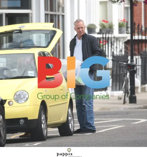 Michael Barrymore makes funny faces in West London