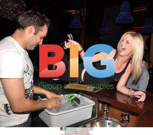 Singer Dane Bowers bartends at Dandelion Bar