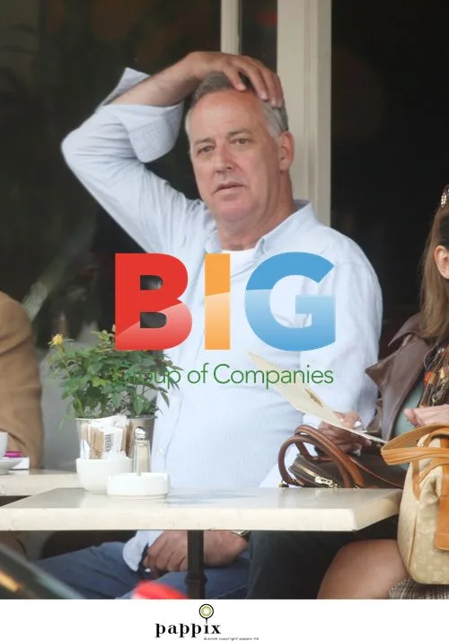 Michael Barrymore makes funny faces while out with friend