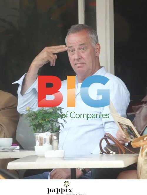 Michael Barrymore makes funny faces in London