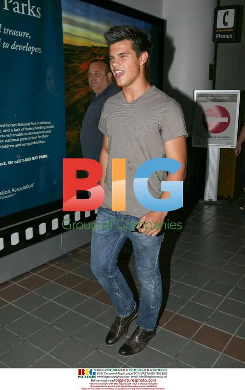 Taylor Lautner and father at LAX