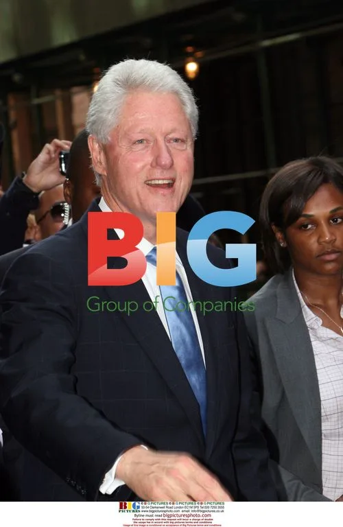Bill Clinton leaving Scholastic store in Soho