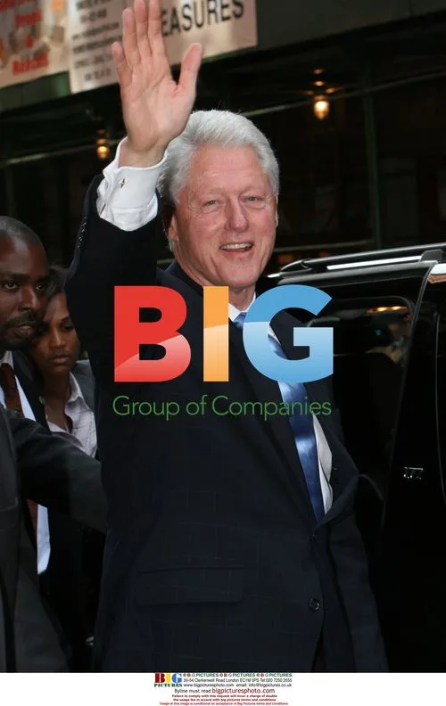 Bill Clinton leaves Scholastic store in Soho
