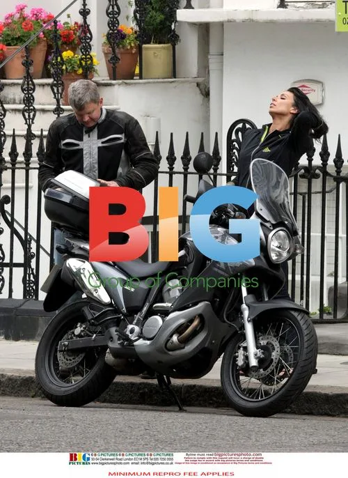 Adrian Chiles and Christine Bleakley on moped