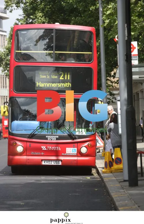 John Simpson Riding London Bus