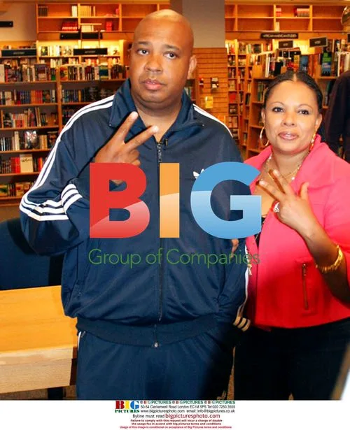 Rev Run and Justine Simmons at book signing