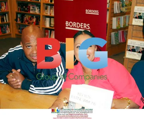 Rev Run and Justine Simmons at book signing