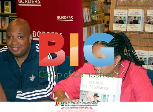 Rev Run and Justine Simmons at book signing