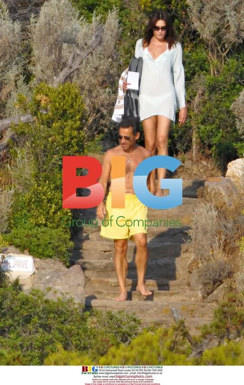Sarkozy and Bruni Sarkozy on holiday in France