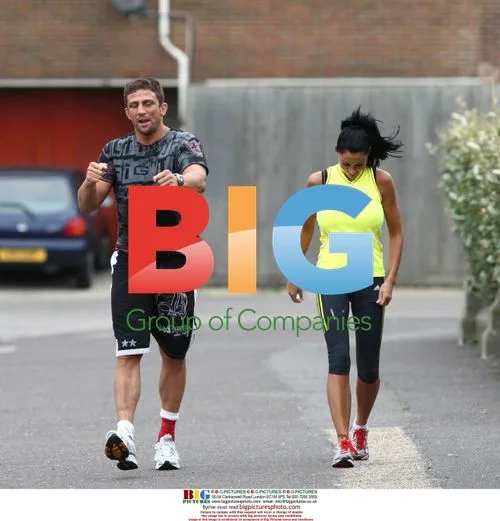 Katie Price and Alex Reid jogging in Brighton