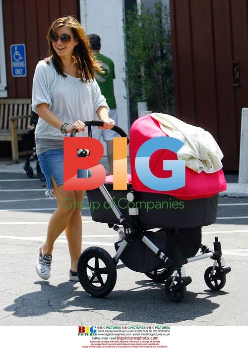 Alyson Hannigan and family take walk
