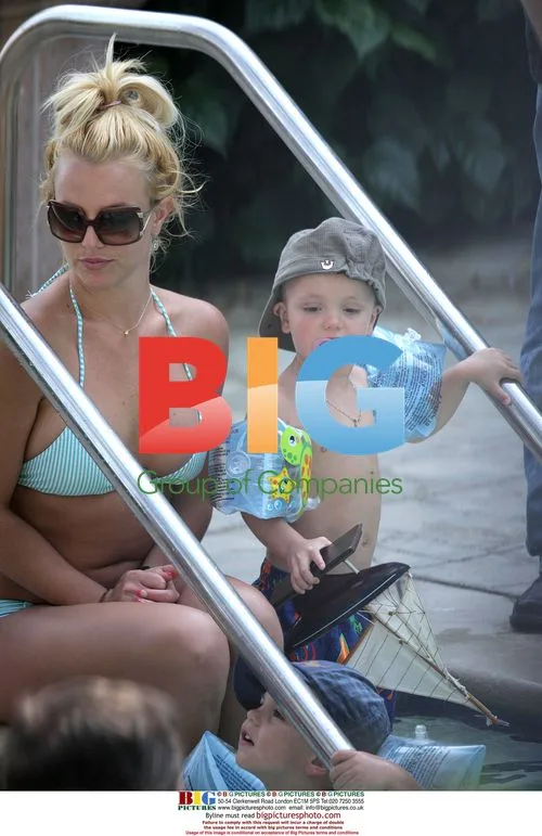 Britney Spears Relaxes Poolside with Sons