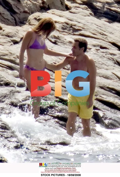 Carla Bruni-Sarkozy in Purple Bikini