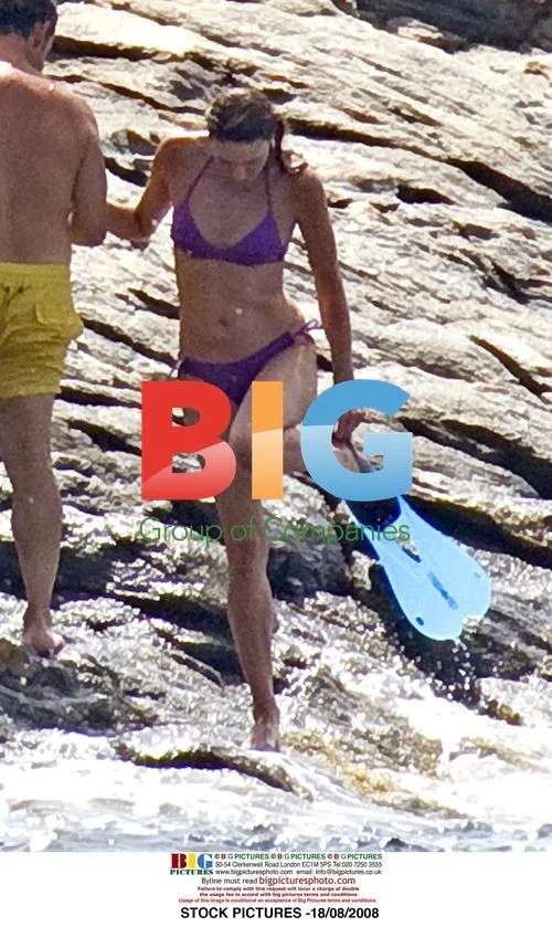 Carla Bruni-Sarkozy in Purple Bikini