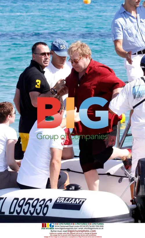 Elton John and David Furnish Relax on Boat in Saint Tropez