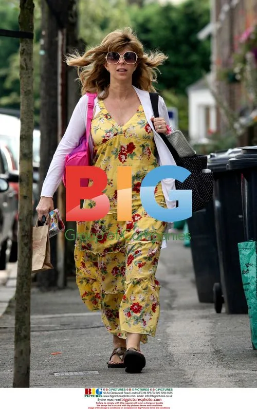 Kate Garraway leaves home with new baby