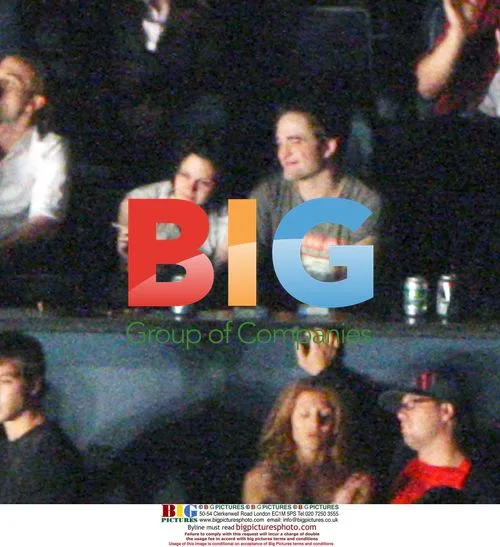 Robert Pattinson and Kristen Stewart at Kings of Leon