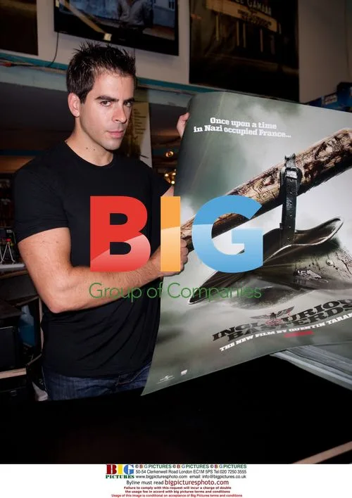 Eli Roth signing movie posters in New York