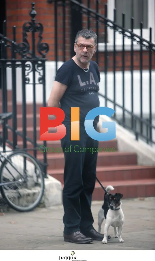 Artist Jack Vettriano walks dog in North London