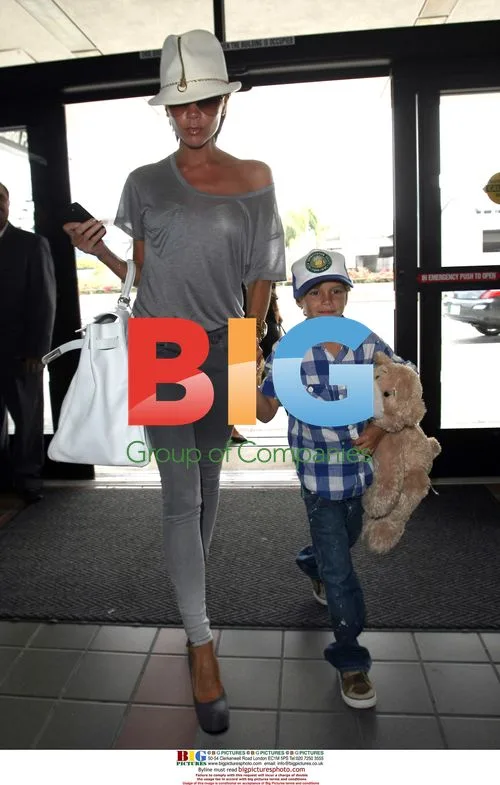 Victoria Beckham and son Romeo at LAX