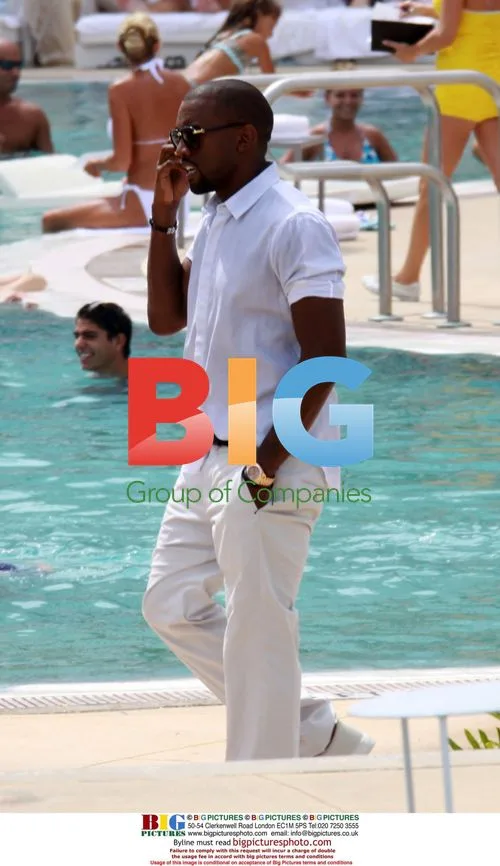 Kanye West and Amber Rose poolside in Barcelona