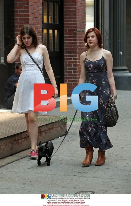 Frances Bean Cobain leaves hotel with friend