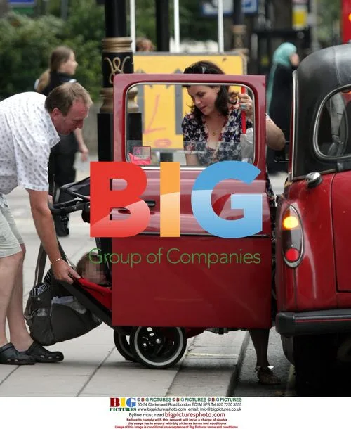 Kirstie Allsopp with family in park, UK