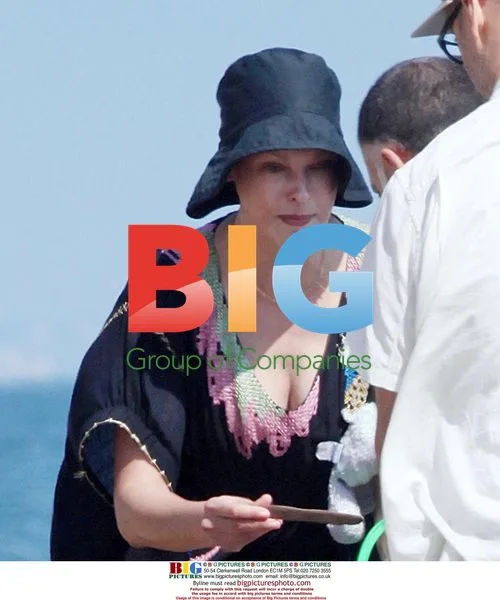 Linda Evangelista Strolls Malibu Beach