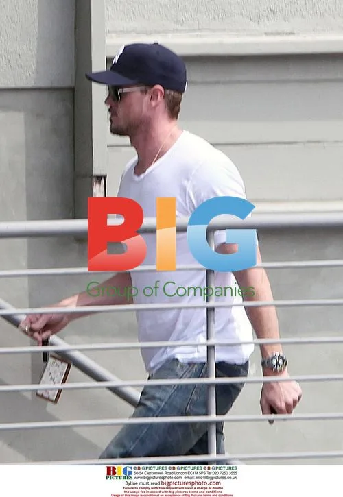 Eric Dane and wife Rebecca Gayheart arriving home