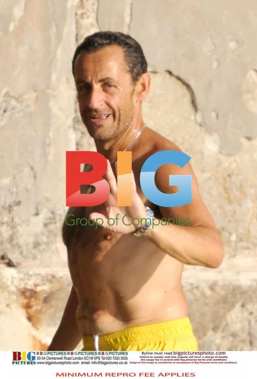 Sarkozy and Bruni Swim at French Home