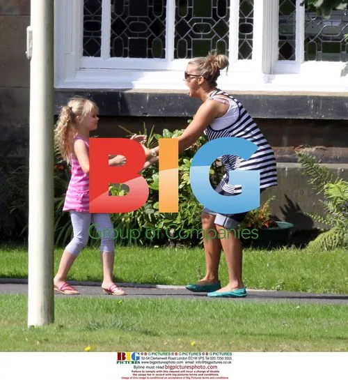 Kerry Katona and family visit private school
