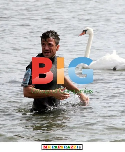 Peter Andre takes windsurfing lesson with brother