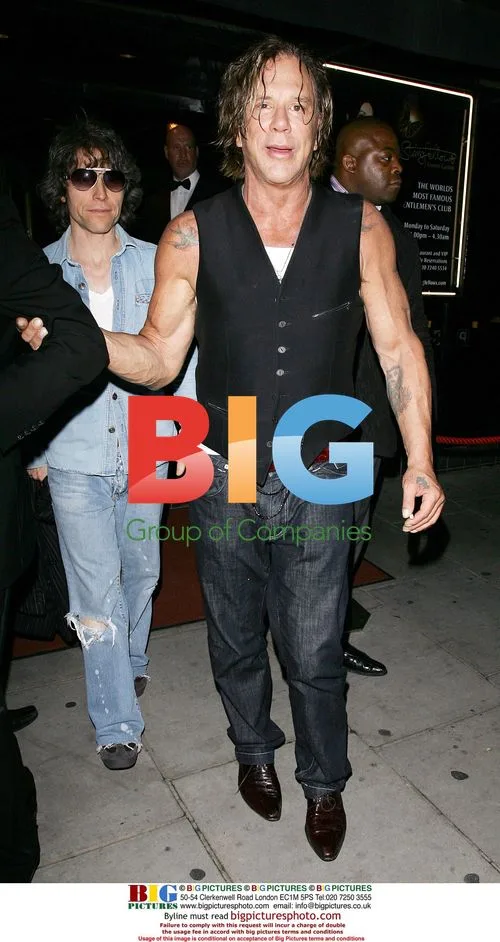 Mickey Rourke leaves London club