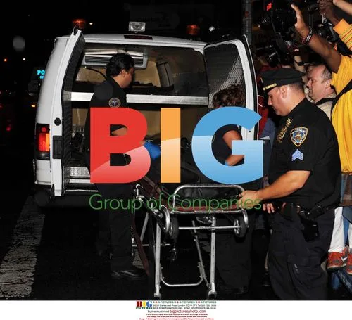 DJ AM's body being removed from NYC apartment