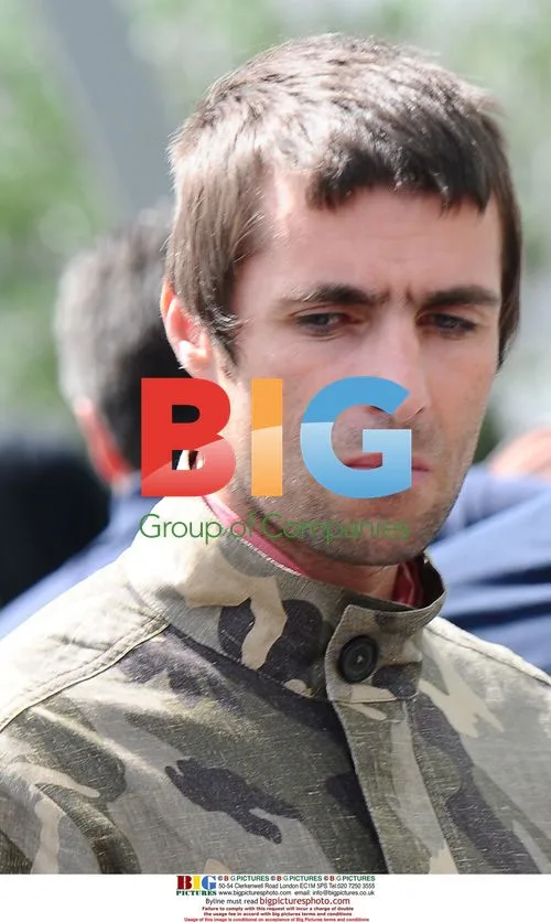 Oasis Members Leaving Hotel for Festival
