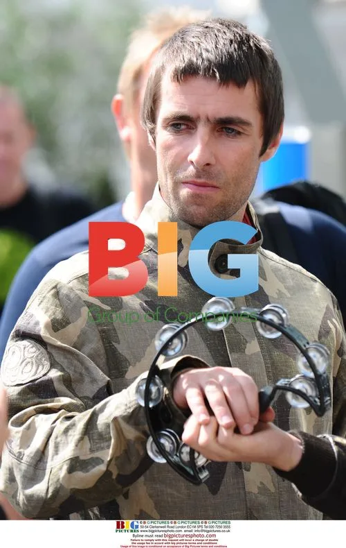 Oasis Band Members Leaving Hotel for Paris Festival