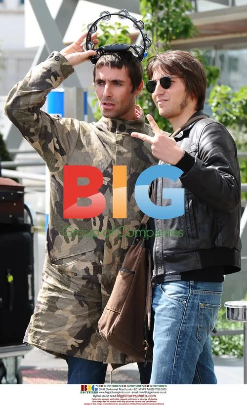 Oasis Band Members Leaving Hotel for Paris