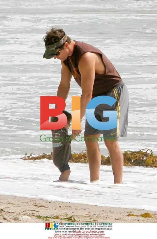 Matthew McConaughey at the beach with son