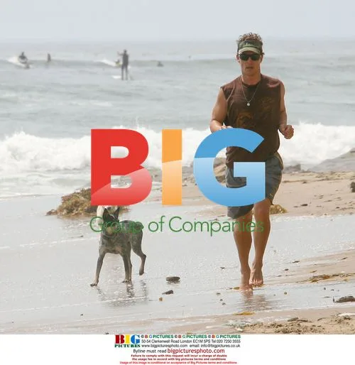 Matthew McConaughey and son at the beach