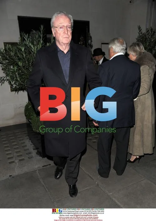 Caine, Moore, and Winner Dine at Scotts Restaurant
