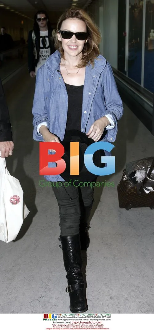 Kylie Minogue arrives at Heathrow from New York