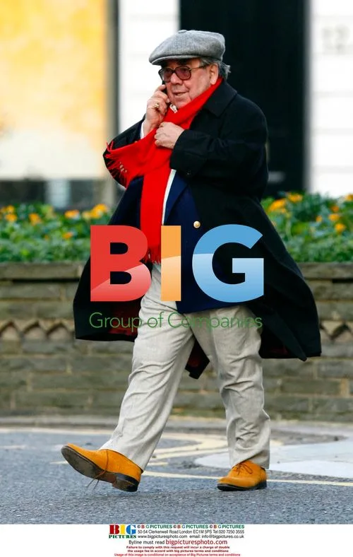 Ronnie Corbett Out in Jolly Fashion