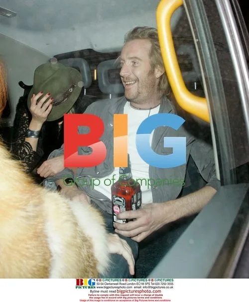 Rhys Ifans and Kimberly Stewart leave Whisky Mist