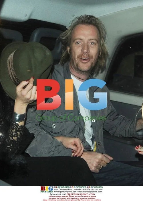 Rhys Ifans and Kimberley Stewart leaving Hilton, London