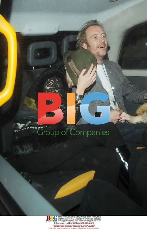 Rhys Ifans and Kimberley Stewart leaving Hilton