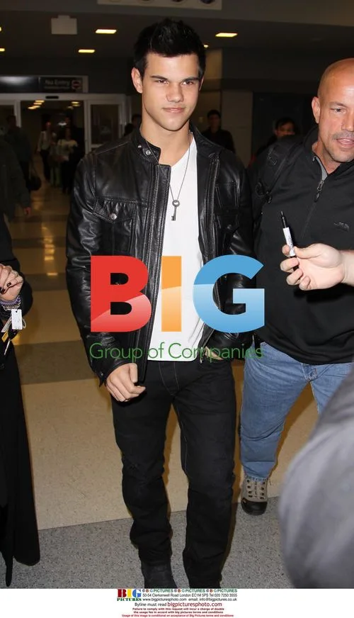 Taylor Lautner Arrives at JFK Airport