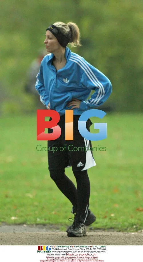 Liam Gallagher and Natalie Appleton jogging in London