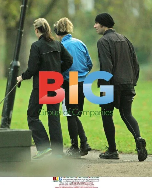 Liam Gallagher and Natalie Appleton run, Nicole Appleton walks dog