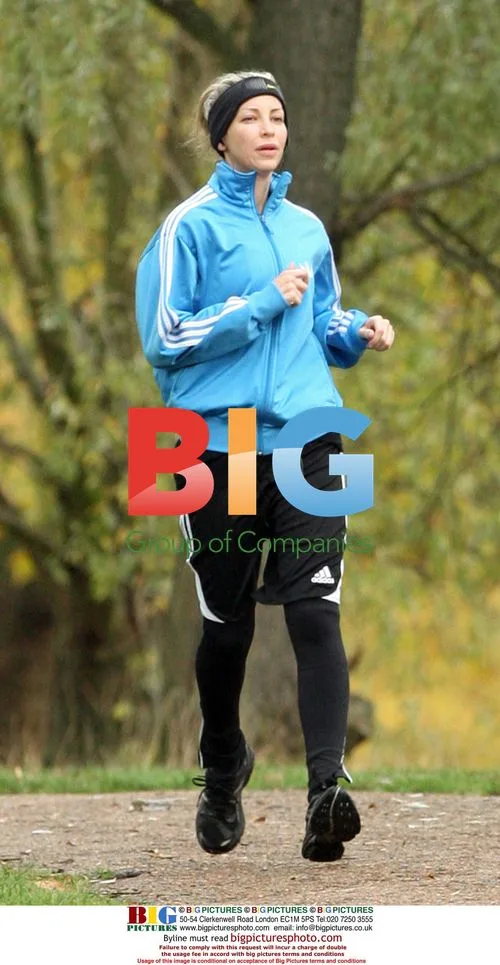 Liam Gallagher and Natalie Appleton jogging in London
